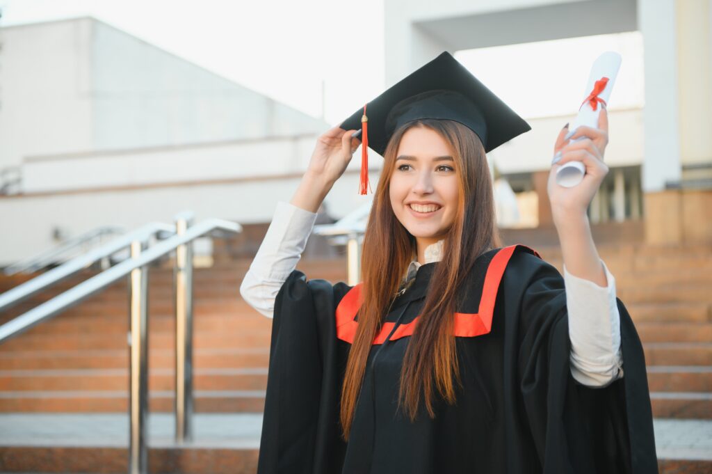Graduation: Student Standing With Diploma.